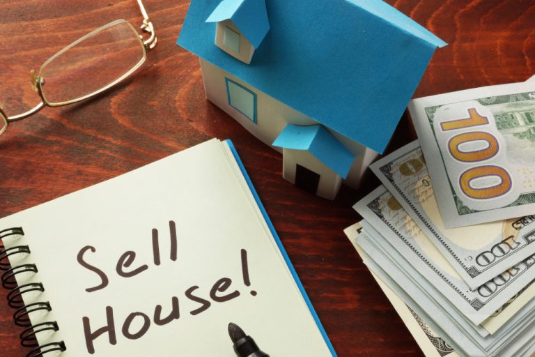 sell house noted on a paper