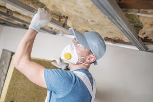 construction worker doing ceiling works